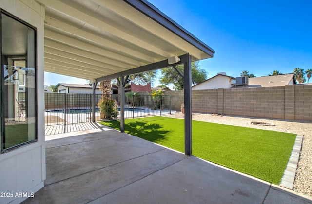 view of patio / terrace with a fenced in pool and a fenced backyard
