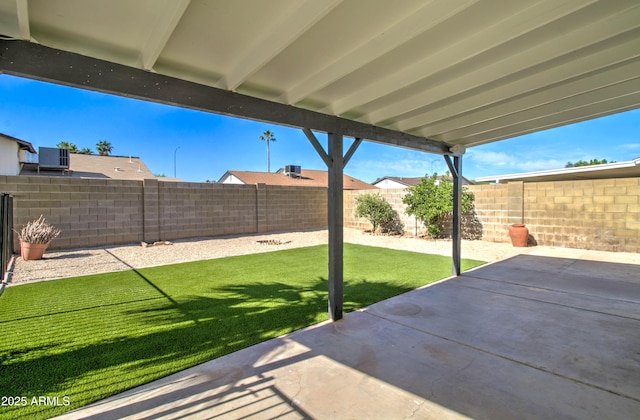 view of patio with central AC and a fenced backyard