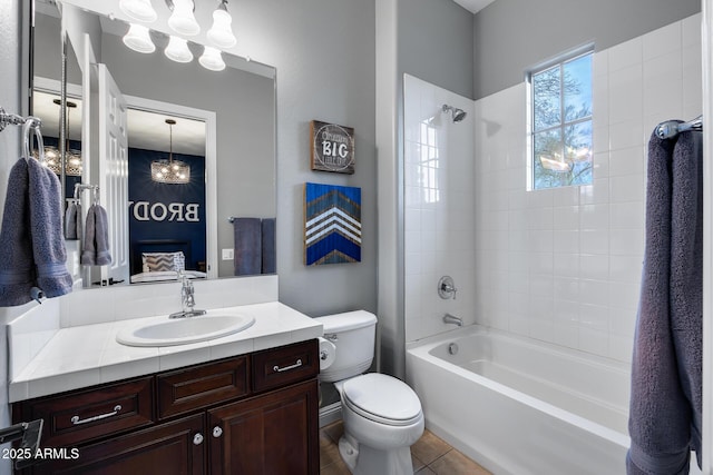 full bathroom with vanity, ensuite bath, tile patterned flooring, shower / washtub combination, and toilet