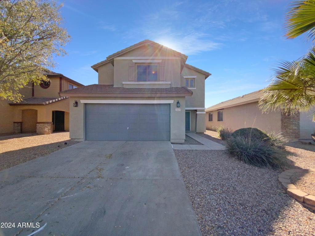 front facade with a garage