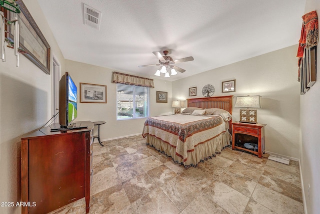 11047 W Irma Ln, Peoria, AZ 85373 - bedroom featuring baseboards, visible vents, and a ceiling fan