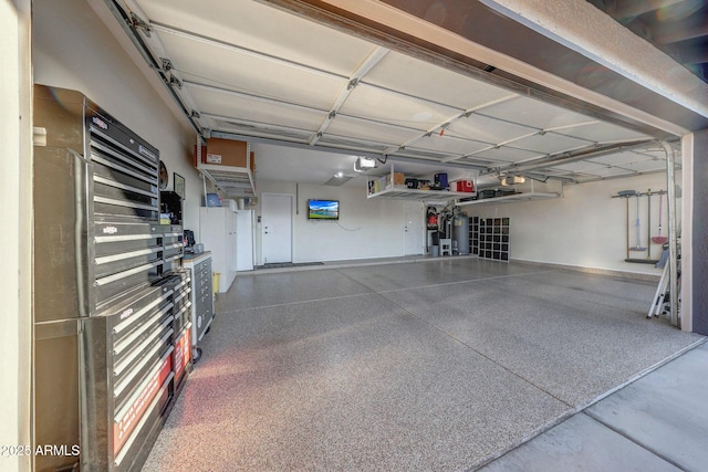 11047 W Irma Ln, Peoria, AZ 85373 - garage featuring a garage door opener and gas water heater
