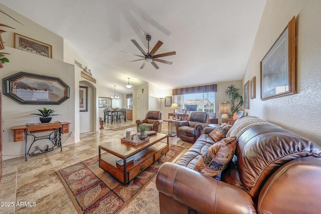 11047 W Irma Ln, Peoria, AZ 85373 - living room featuring vaulted ceiling, arched walkways, and ceiling fan