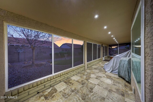 11047 W Irma Ln, Peoria, AZ 85373 - unfurnished sunroom with stone finish floor and recessed lighting