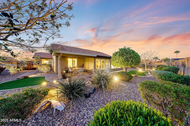 11047 W Irma Ln, Peoria, AZ 85373 - back of property featuring a tile roof, stucco siding, fence, and a patio area