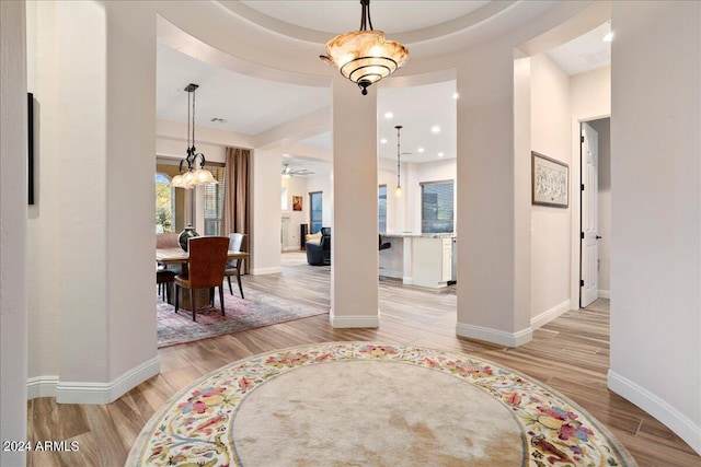 entrance foyer with light wood-type flooring, baseboards, and recessed lighting