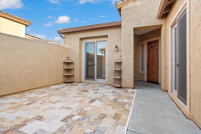 view of patio featuring fence