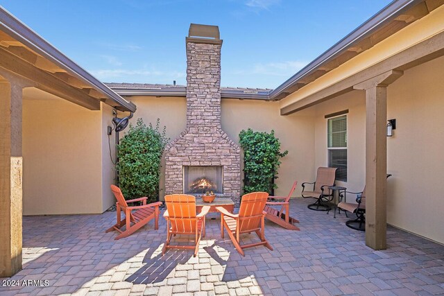 kitchen featuring backsplash, wine cooler, wall chimney exhaust hood, and built in appliances