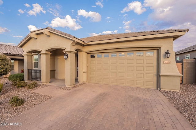 view of front of home with a garage