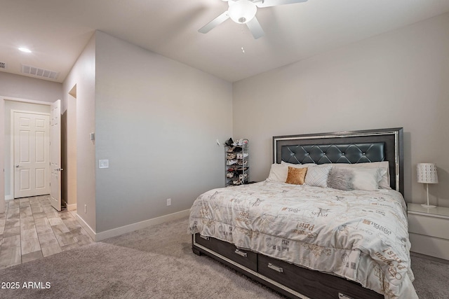 bedroom featuring ceiling fan and light hardwood / wood-style floors