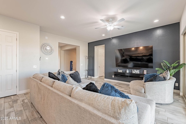 living room with ceiling fan