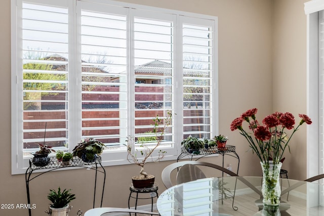 interior space featuring baseboards