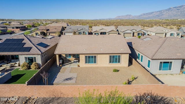 bird's eye view with a residential view and a mountain view