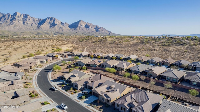 birds eye view of property featuring a mountain view and a residential view