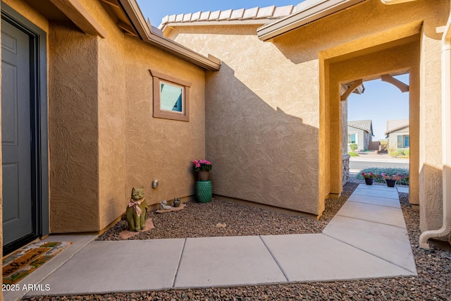 exterior space featuring stucco siding