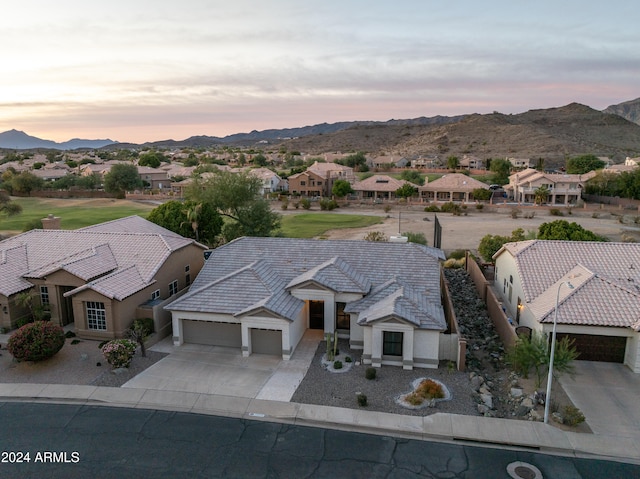 aerial view at dusk with a mountain view