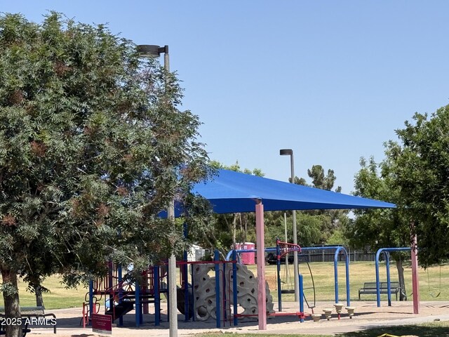view of community with a yard