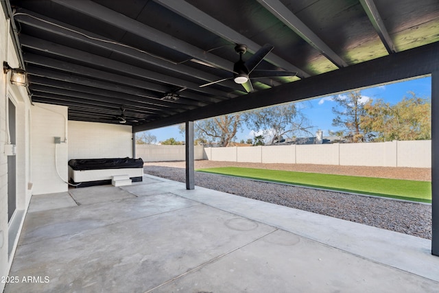 view of patio with a fenced backyard and a ceiling fan