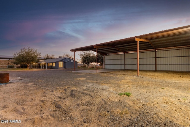22914 W Sunland Ave, Buckeye, AZ 85326 - garage featuring a carport