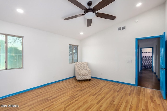 22914 W Sunland Ave, Buckeye, AZ 85326 - unfurnished room featuring lofted ceiling, a ceiling fan, light wood-style floors, recessed lighting, and baseboards