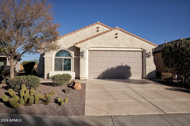 view of front of property featuring a garage