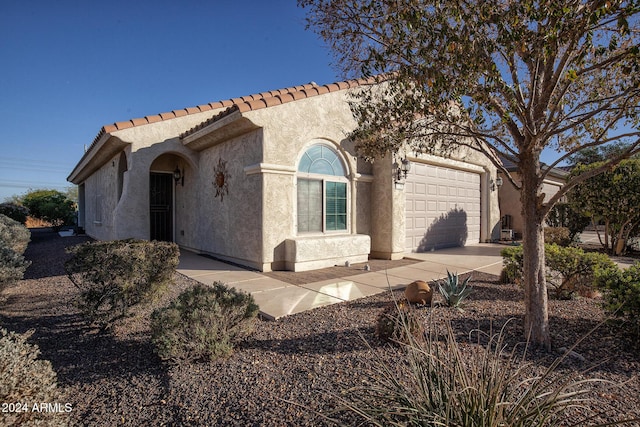 view of front of house with a garage