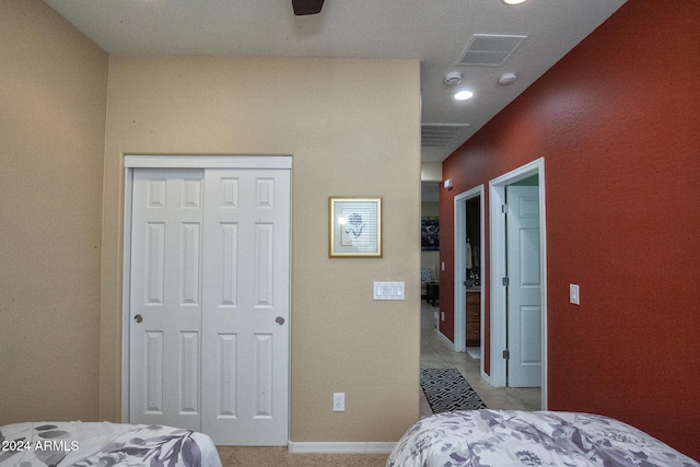 bedroom featuring a closet and ceiling fan