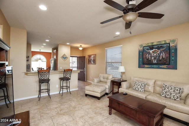 living room with ceiling fan