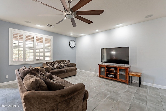 living room with ceiling fan