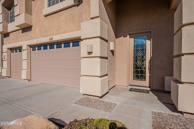 property entrance with a garage