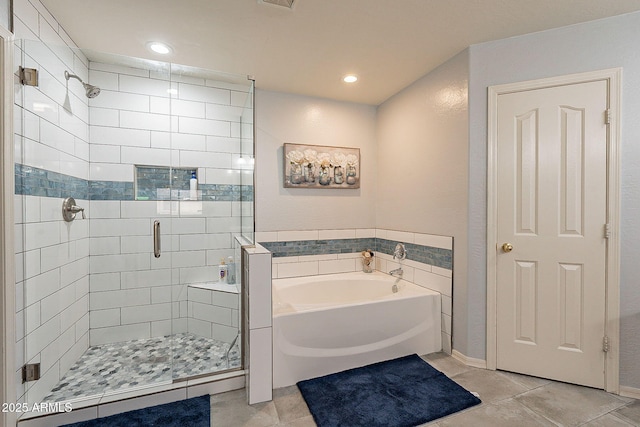 bathroom featuring separate shower and tub and tile patterned flooring