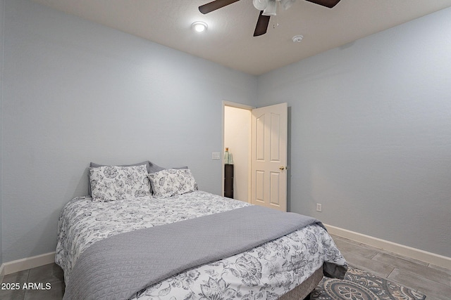 bedroom featuring ceiling fan