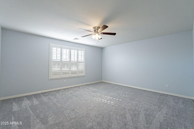 carpeted empty room with ceiling fan