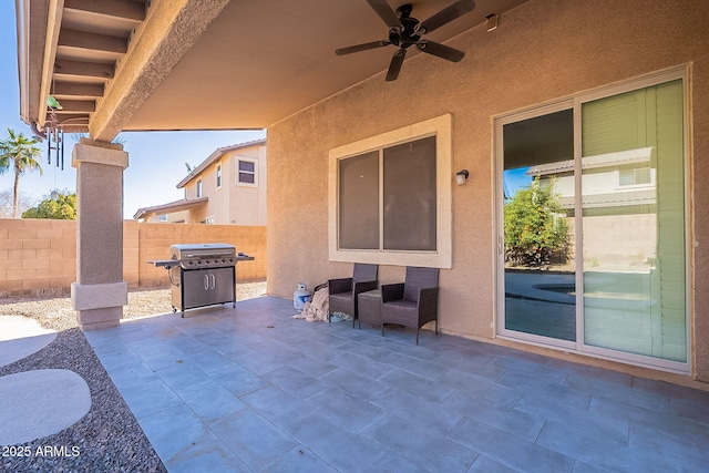 view of patio / terrace with ceiling fan and grilling area