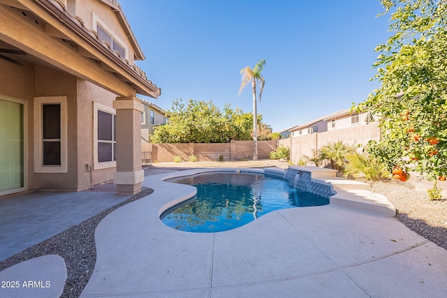 view of swimming pool featuring a patio and pool water feature