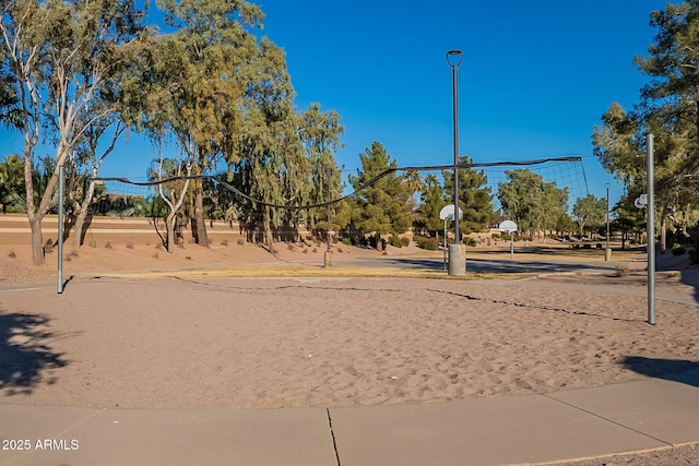 view of property's community featuring volleyball court