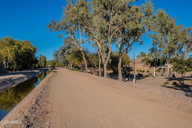 view of street featuring a water view