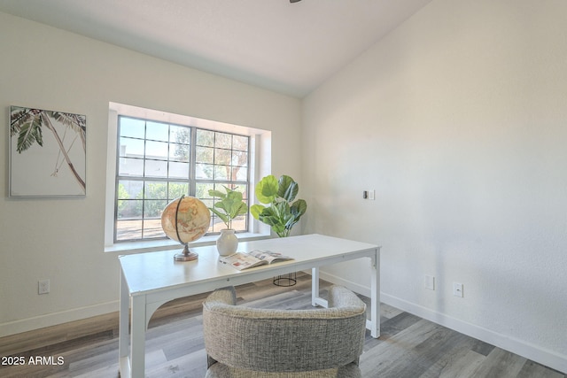 office featuring hardwood / wood-style flooring and vaulted ceiling