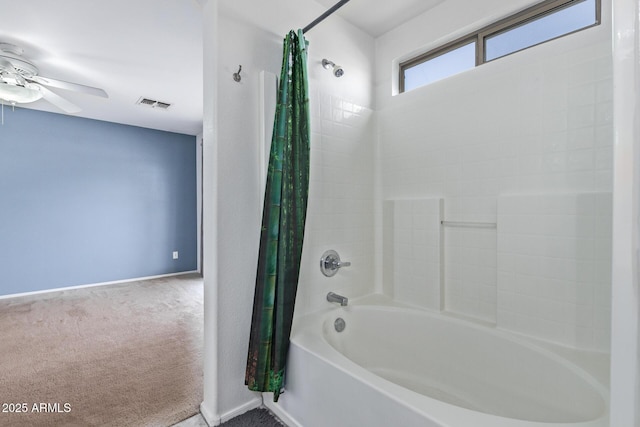 bathroom with shower / tub combo with curtain