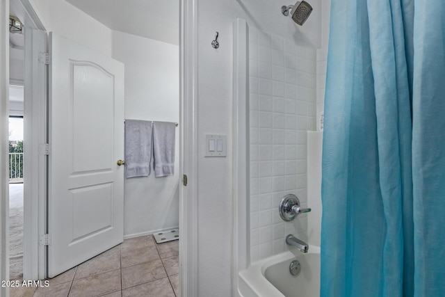 bathroom featuring tile patterned flooring and shower / bath combo with shower curtain