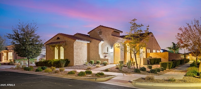 view of mediterranean / spanish-style house