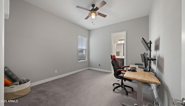 office space with ceiling fan and carpet flooring