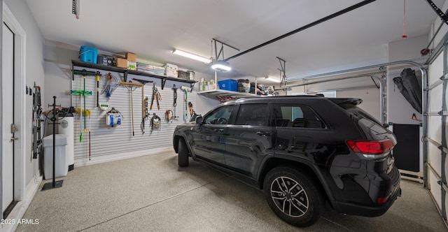 garage featuring a garage door opener