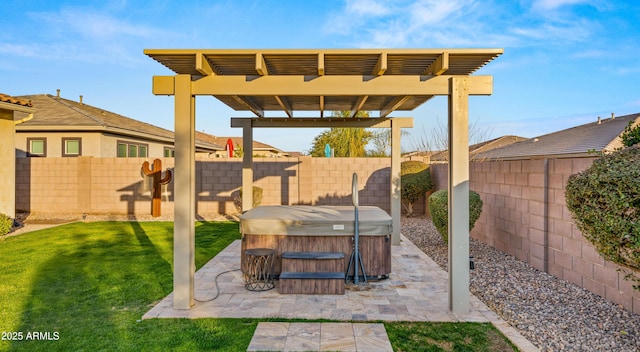 view of patio / terrace with a hot tub and a pergola