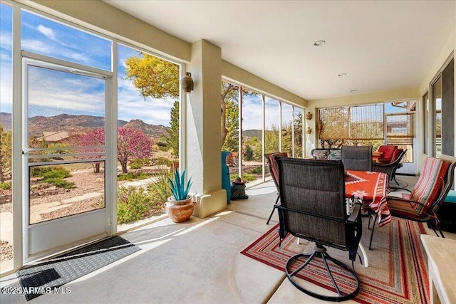 10796 N Saddle Pass Rd, Prescott, AZ 86305 - sunroom / solarium featuring a mountain view and carpet