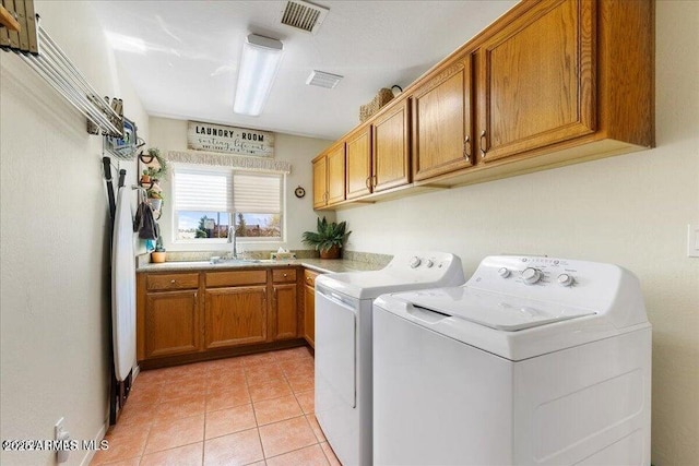10796 N Saddle Pass Rd, Prescott, AZ 86305 - laundry room featuring cabinet space, washer and clothes dryer, and light tile patterned floors