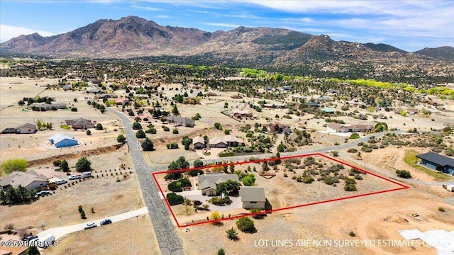 10796 N Saddle Pass Rd, Prescott, AZ 86305 - aerial view of sparsely populated area with a mountain backdrop and property parcel outlined
