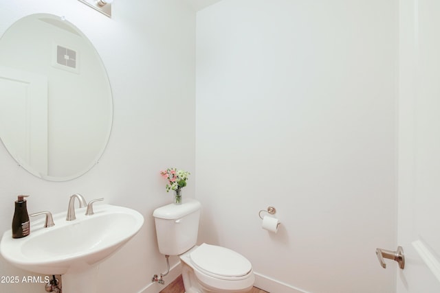 2511 W Queen Creek Rd Unit 374, Chandler, AZ 85248 - half bath with a sink, toilet, and baseboards