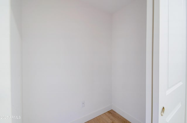 2511 W Queen Creek Rd Unit 374, Chandler, AZ 85248 - spare room featuring baseboards and light wood-style flooring