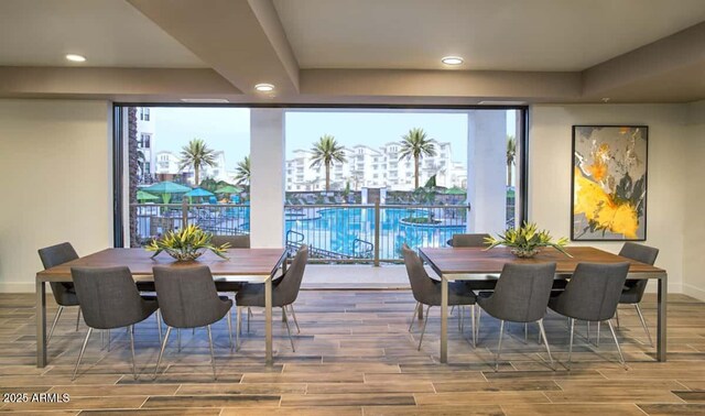 2511 W Queen Creek Rd Unit 374, Chandler, AZ 85248 - dining room with recessed lighting, wood finished floors, baseboards, and a wall of windows